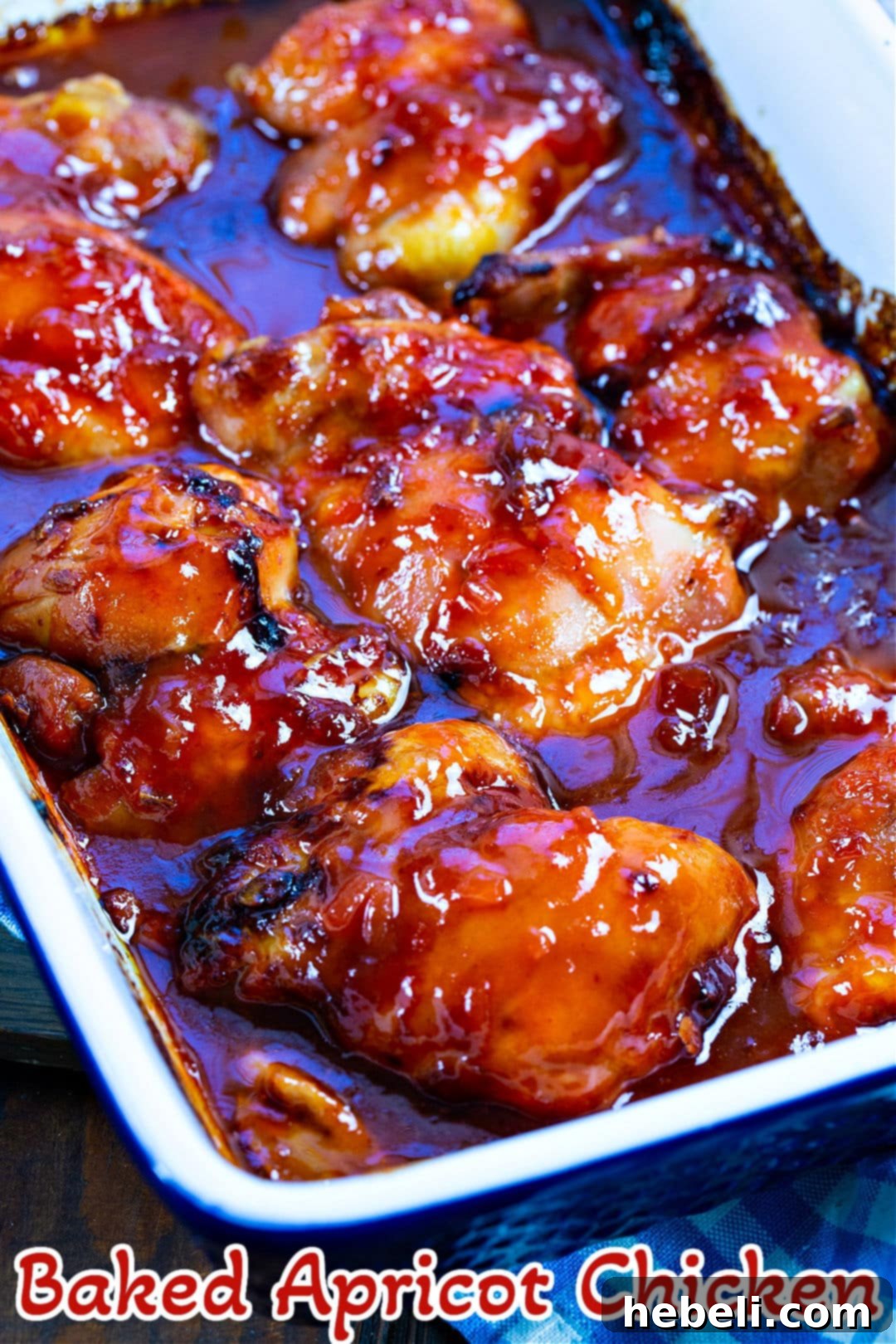 Close-up of Baked Apricot Chicken in a baking dish, highlighting the rich, sticky glaze.