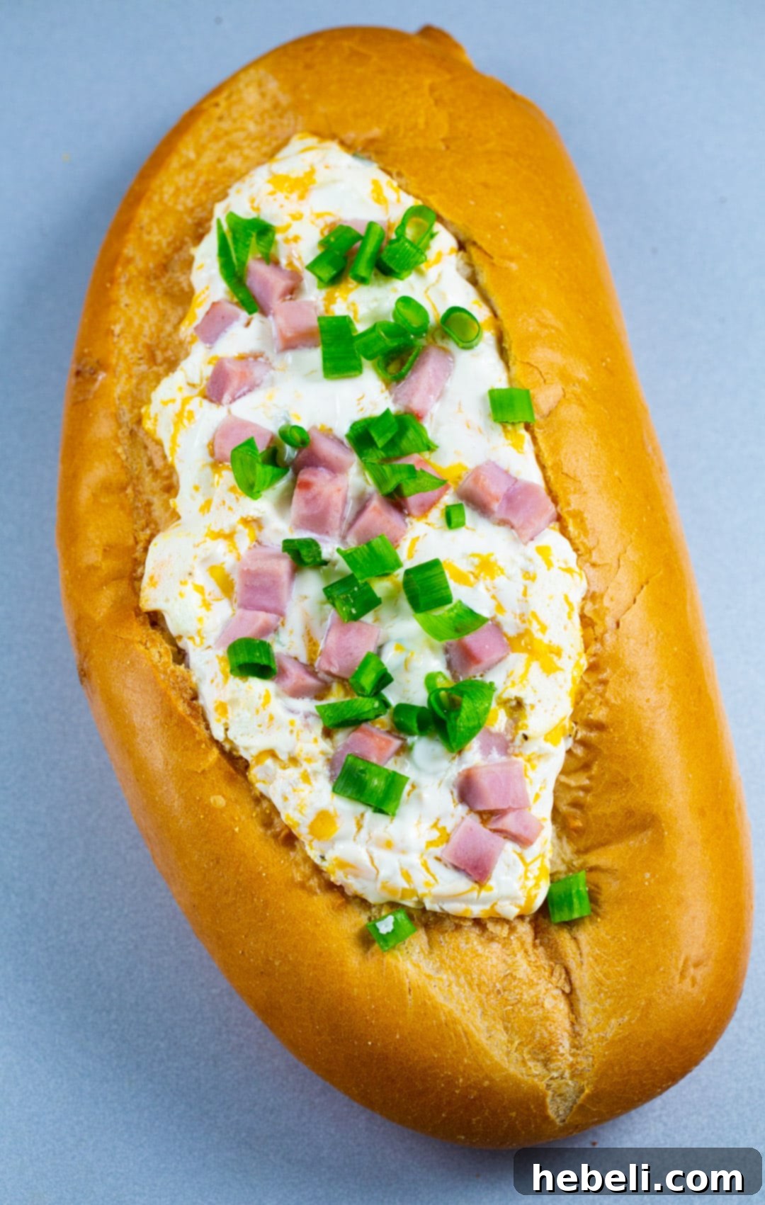 Irresistible Mississippi Sin Dip 3 Creamy dip in hollowed out bread.