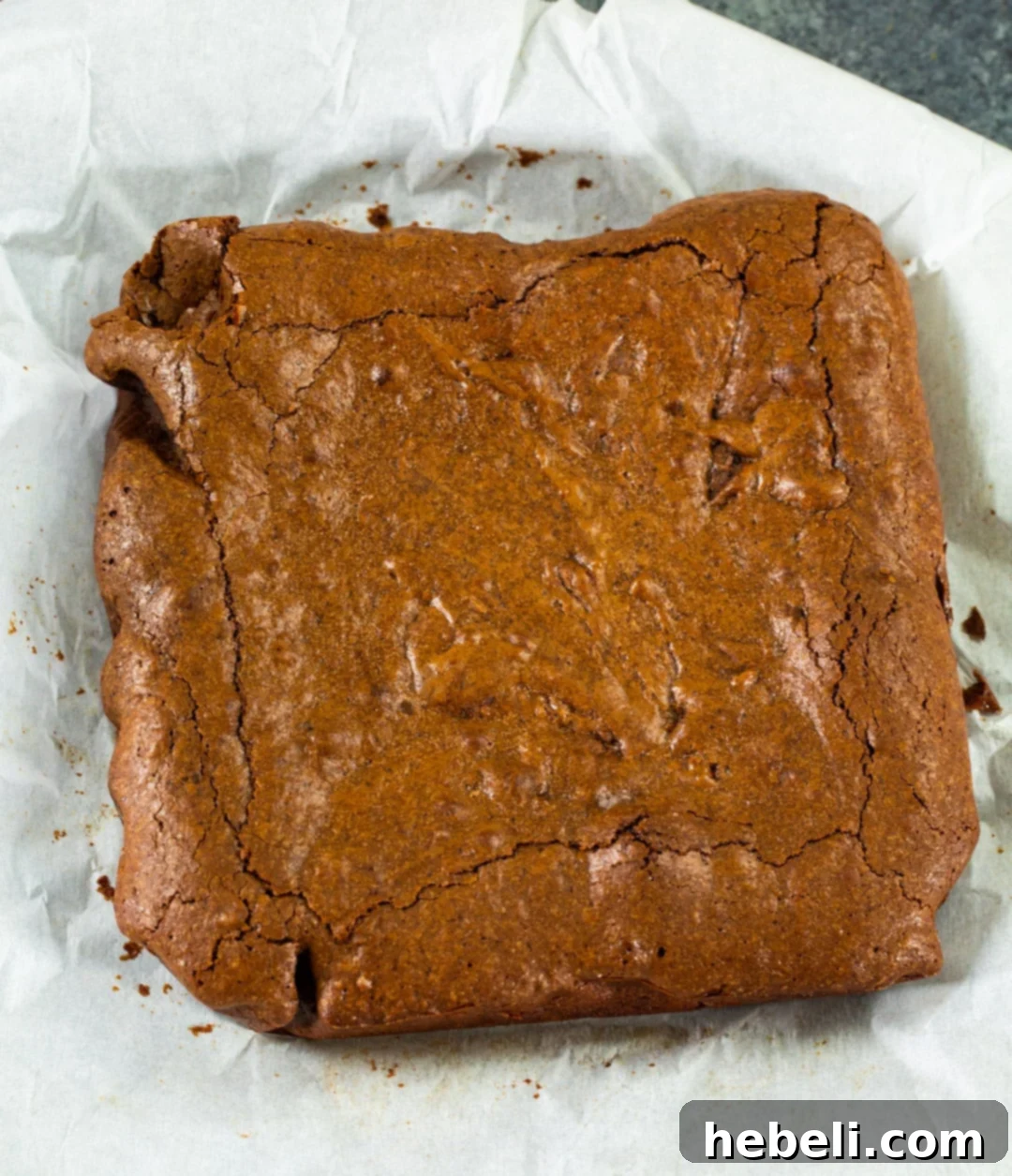Fiery Fudge Delights 3 Brownies before being cut into squares, showcasing a perfect texture.