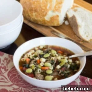 A bowl of Southern Minestrone with lima beans and collard greens