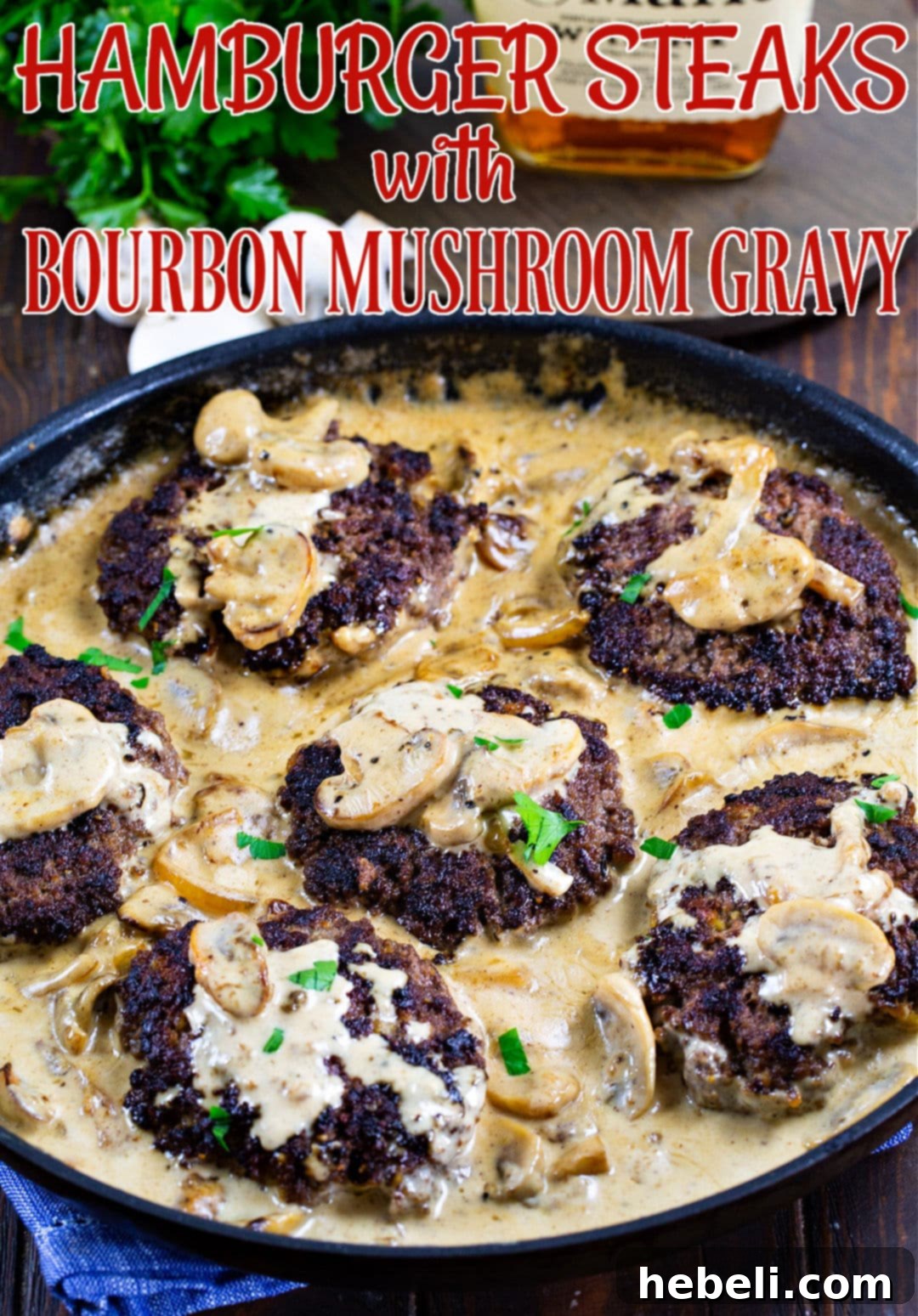 Bourbon Mushroom Gravy Hamburger Steaks 3 Close-up of seared Hamburger Steaks in a skillet.
