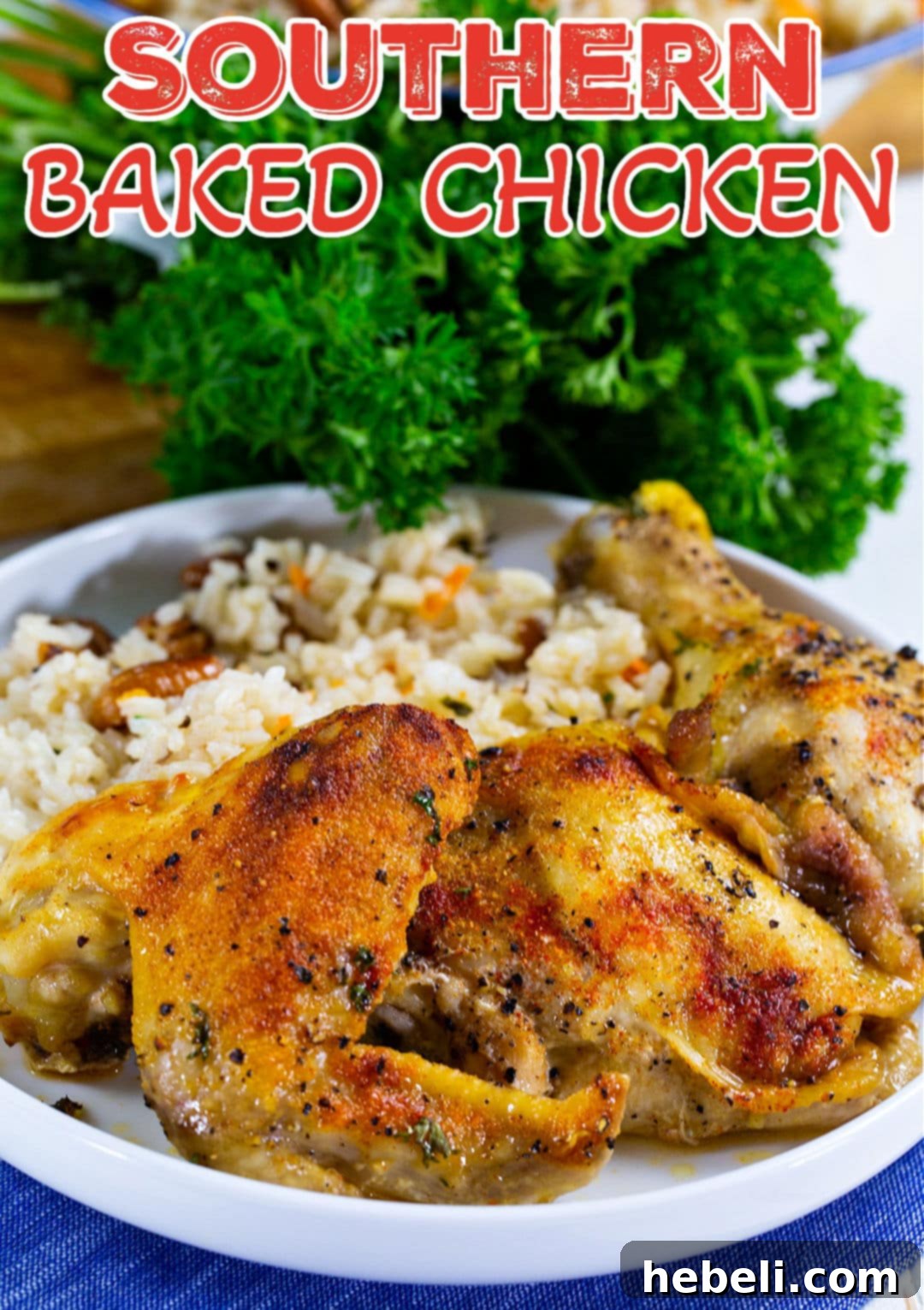 Classic Southern Baked Chicken 5 Southern Baked Chicken served on a plate with fluffy white rice, ready to be enjoyed.