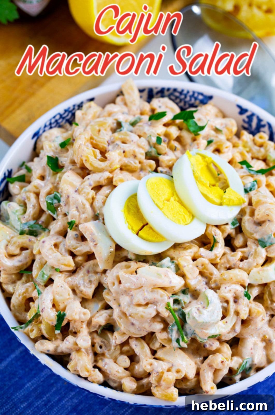 Kickin' Cajun Macaroni Salad 6 A large serving of Cajun Macaroni Salad, showcasing its inviting texture and rich color, ready for a gathering.