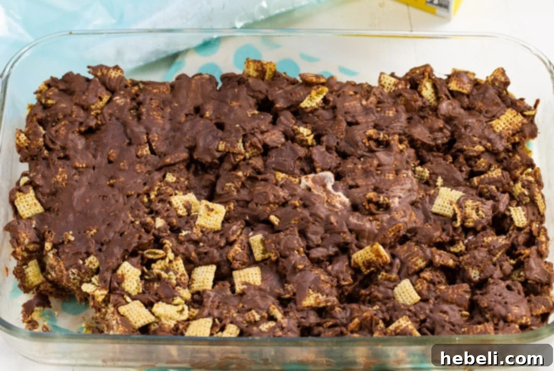 Bar mixture in a baking dish, perfectly spread and ready to set.