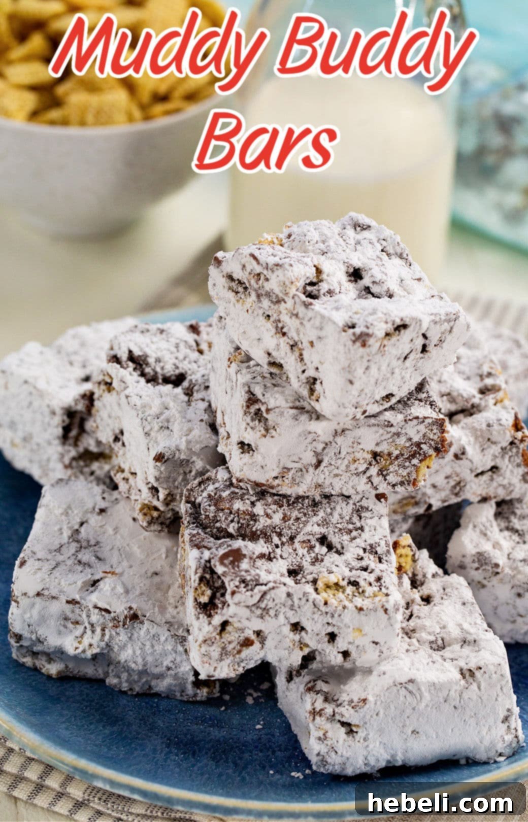 Muddy Buddy Bars stacked on a plate, displaying their delicious texture and inviting appearance.