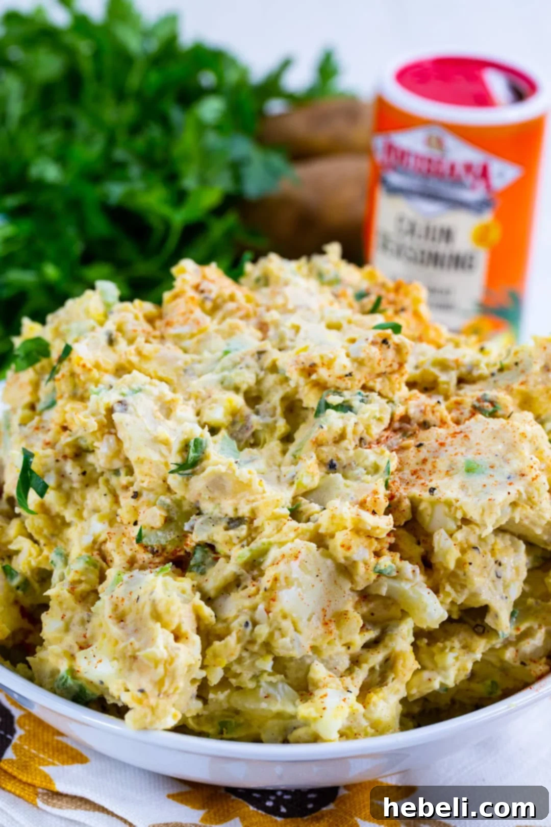 Cajun Kick Potato Salad 4 Cajun Potato Salad in a decorative serving bowl.