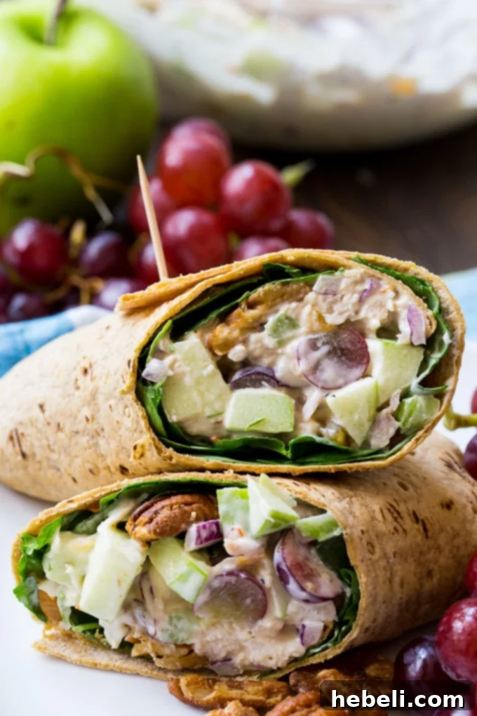 Close-up of fresh Chicken Salad with apples, grapes, and spicy pecans, ready to be wrapped