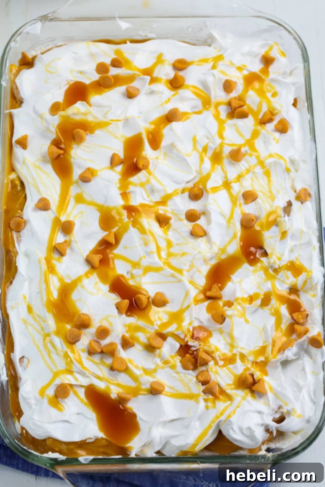 No-Bake Caramel Apple Lush beautifully layered in a clear baking dish.