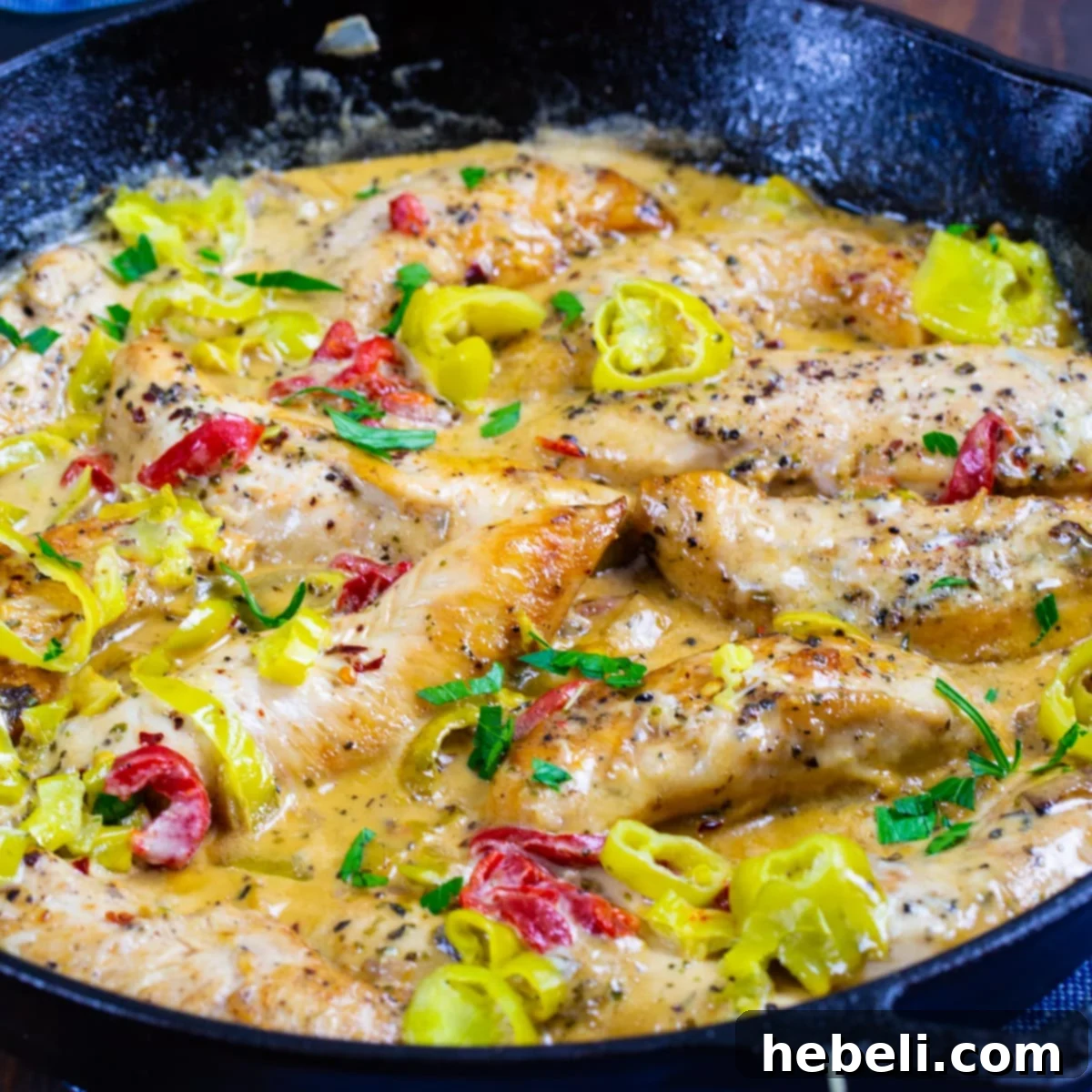 Creamy Pepperoncini Chicken in a cast iron skillet.