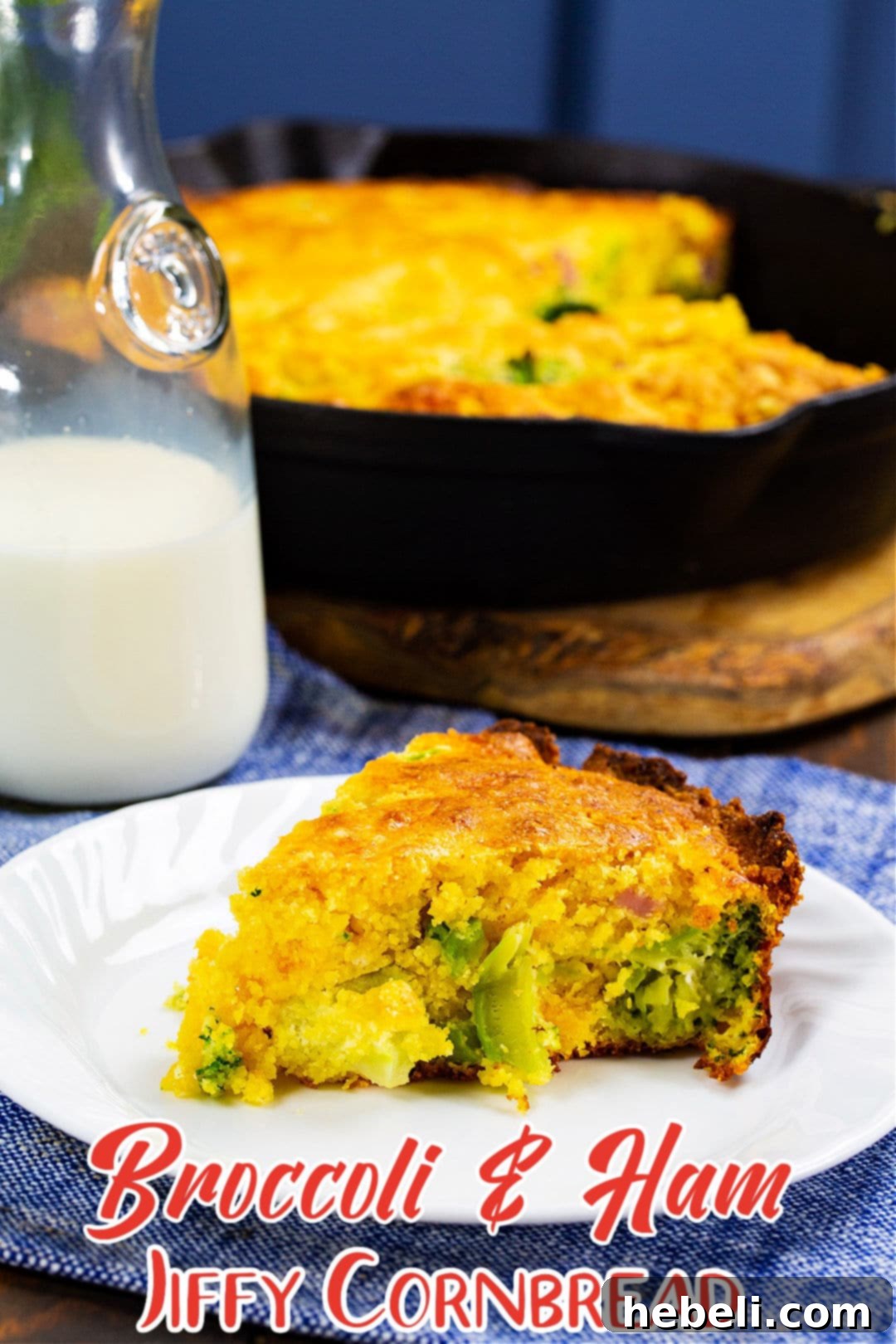 A perfectly portioned slice of Broccoli and Ham Jiffy Cornbread presented on a white plate, ready to eat.