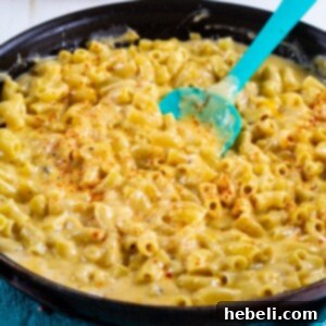 Spicy Mac and Cheese with a spoon.
