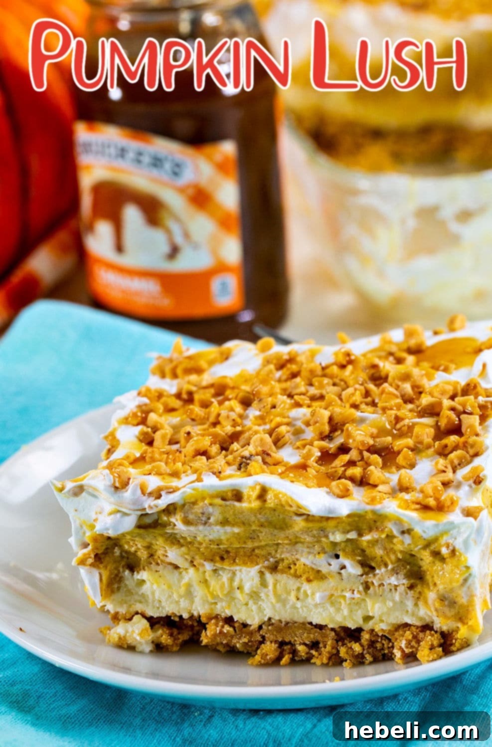 Decadent Pumpkin Delight 7 A single square of Pumpkin Lush with visible distinct layers on a small white plate, ready for a delicious bite.