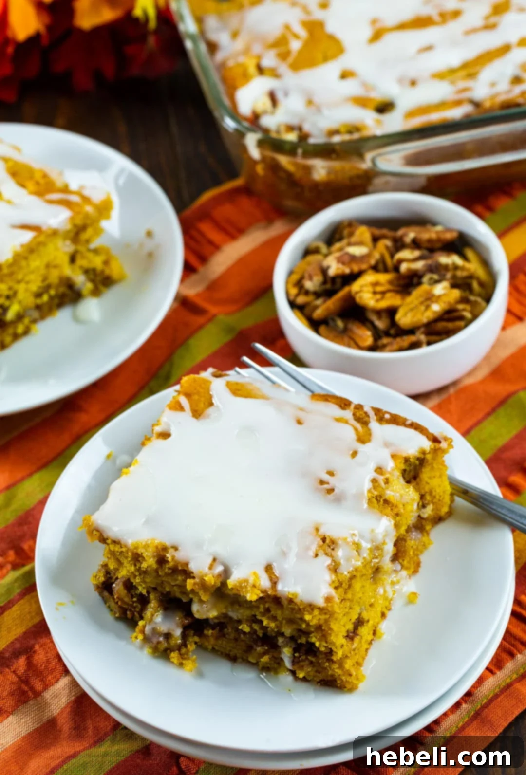 Honey Glazed Pumpkin Swirl Cake 3 A bowl filled with chopped pecans, essential for the cake's irresistible filling.
