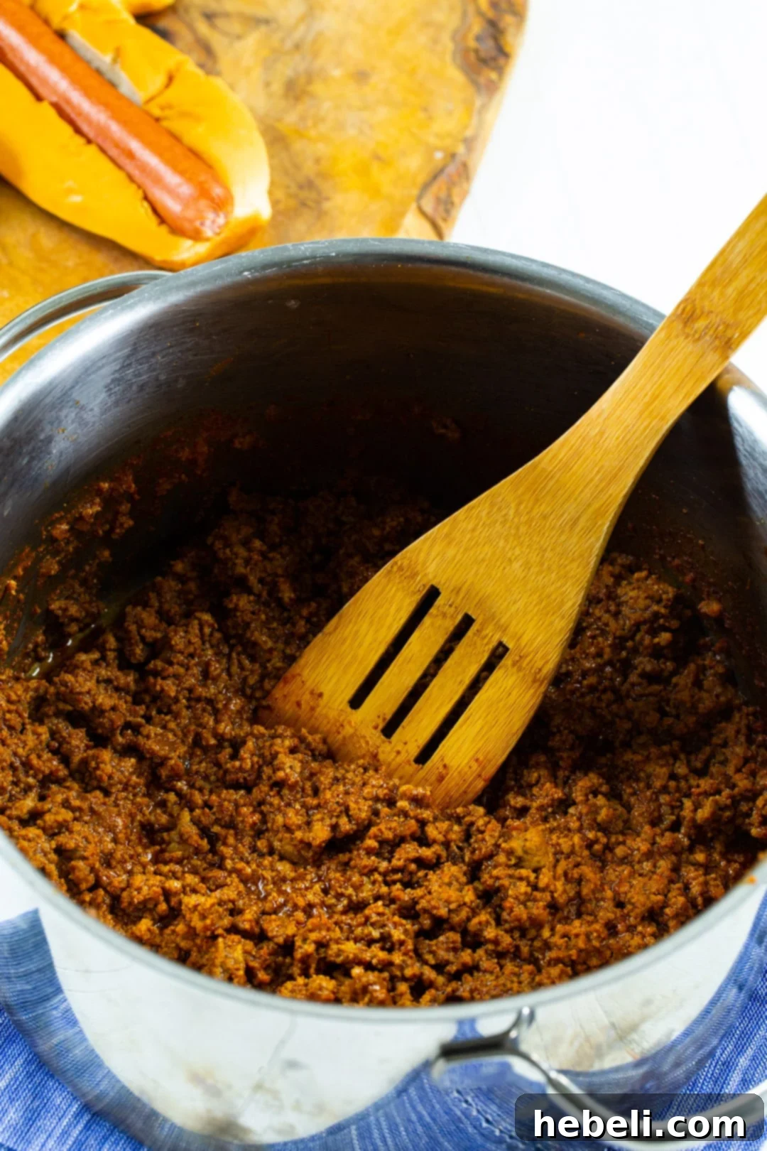 Hot Dog Chili simmering in a pot.