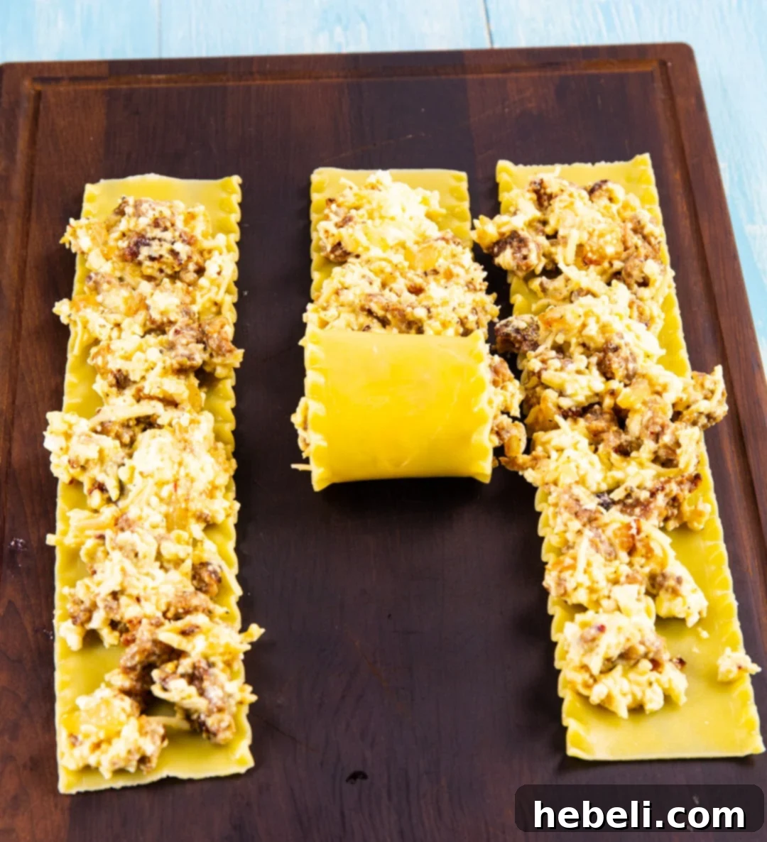 Step-by-step assembly of Italian Sausage Lasagna Roll-Ups on a cutting board.