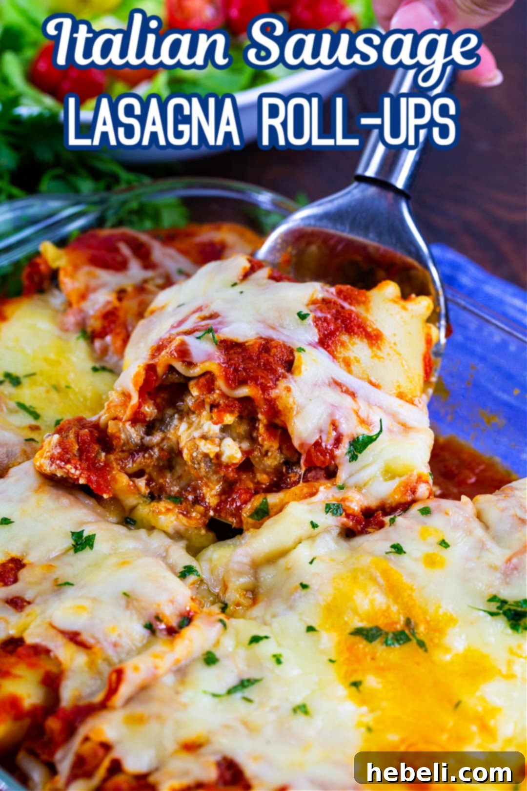 Close-up of a perfectly baked Italian Sausage Lasagna Roll-Up with melted cheese, ready to be served.