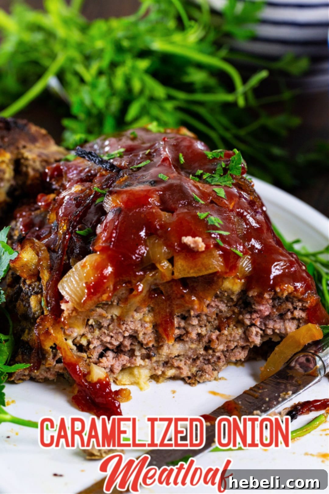 Sweet & Savory Caramelized Onion Meatloaf 5 Close-up of a slice of Caramelized Onion Meatloaf, showing the interior texture and glaze.