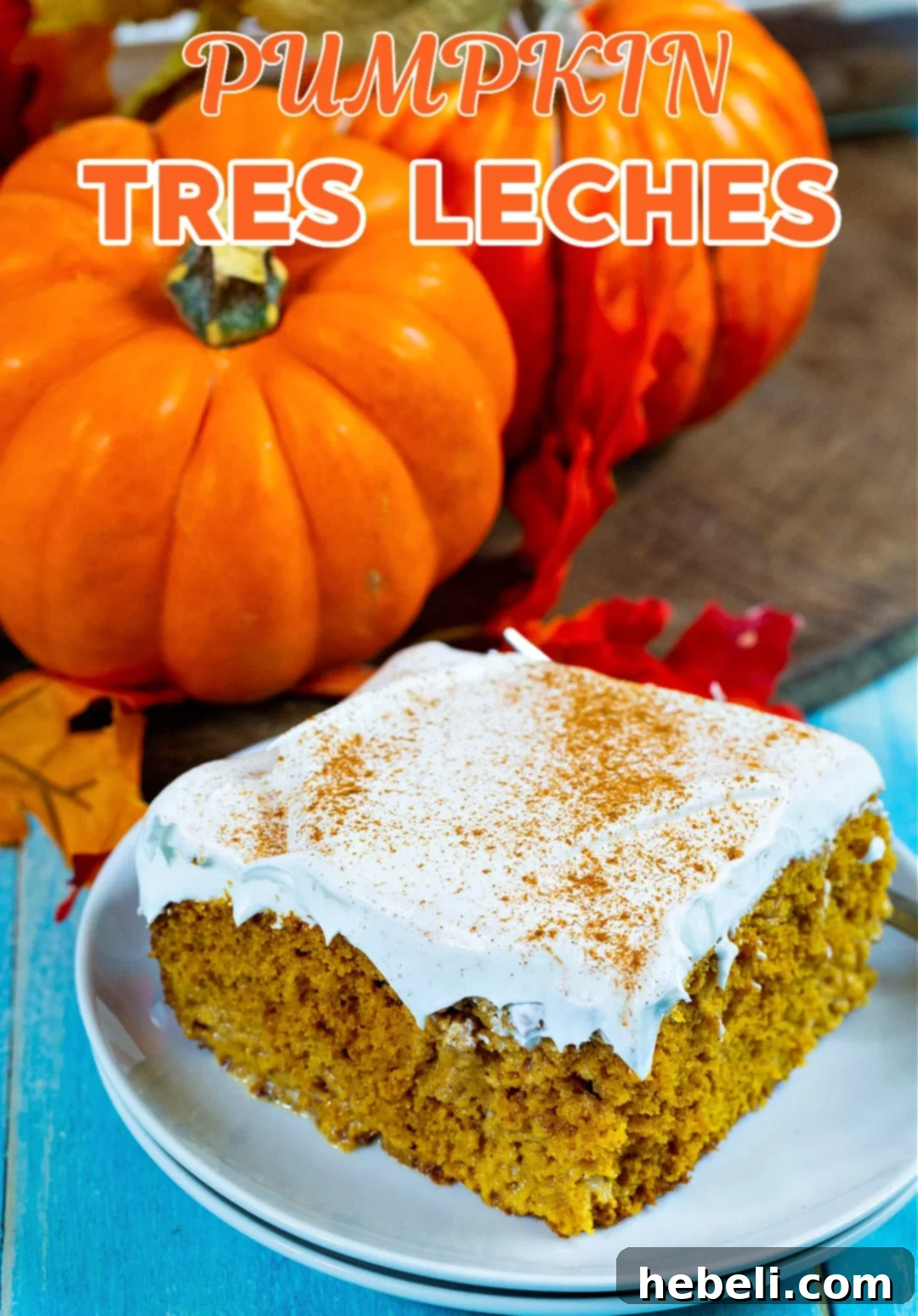 Spiced Pumpkin Tres Leches Cake 6 Another enticing slice of Pumpkin Tres Leches Cake on a plate, showcasing its layered texture and appealing presentation.