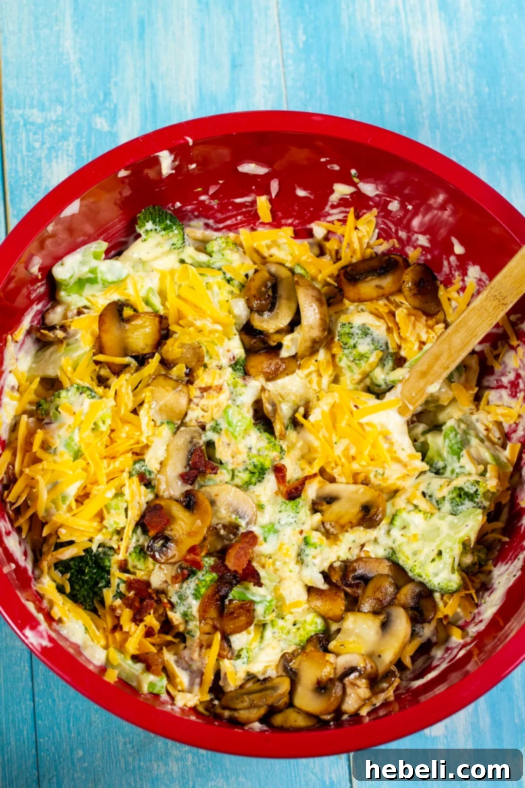 Casserole ingredients mixed together in bowl.