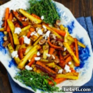 Final dish of Roasted Carrots and Parsnips with Candied Pecans and Goat Cheese