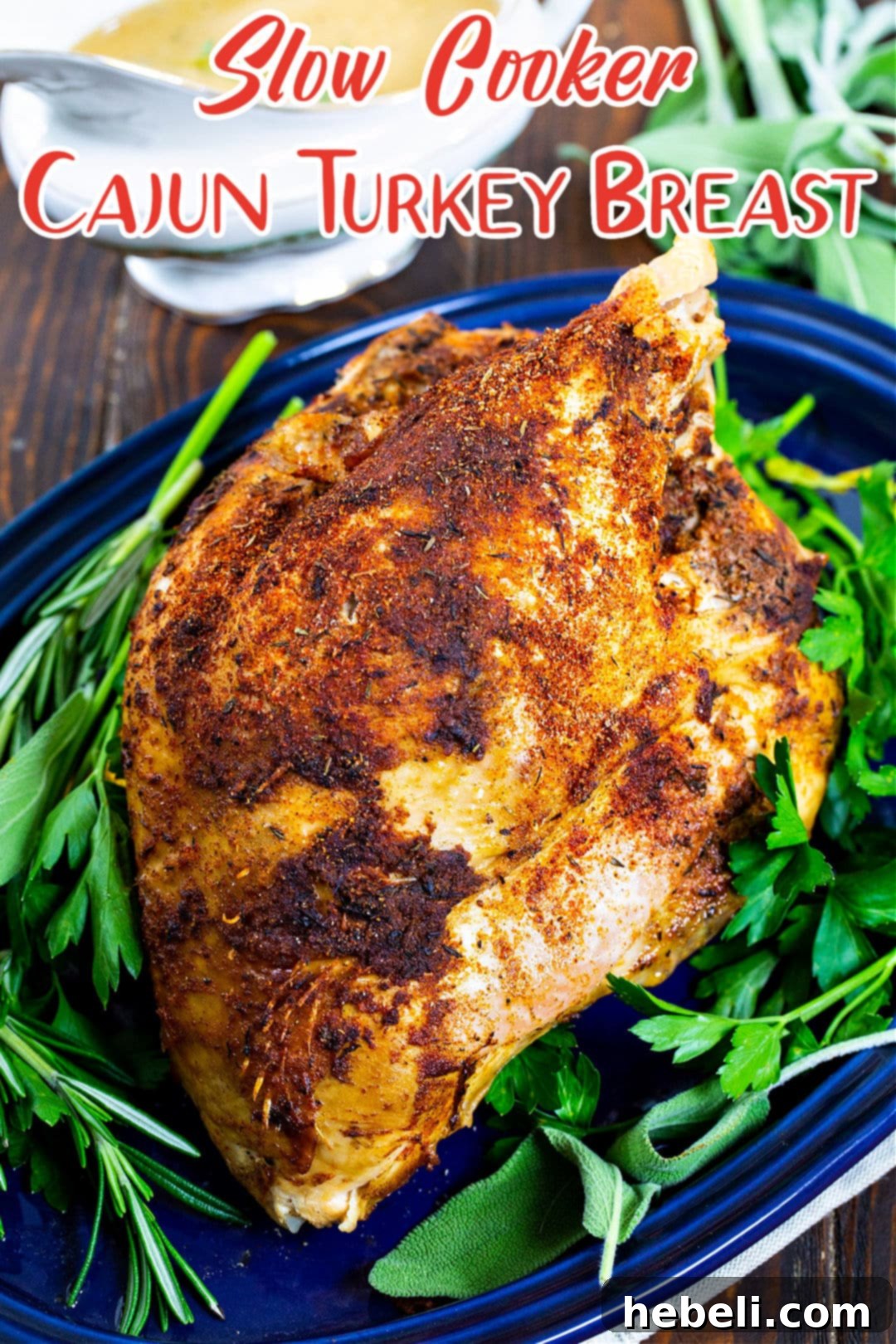 Tender Cajun Slow Cooker Turkey 5 A beautifully golden-brown turkey breast, garnished with fresh green parsley, presented on a platter for a festive meal.