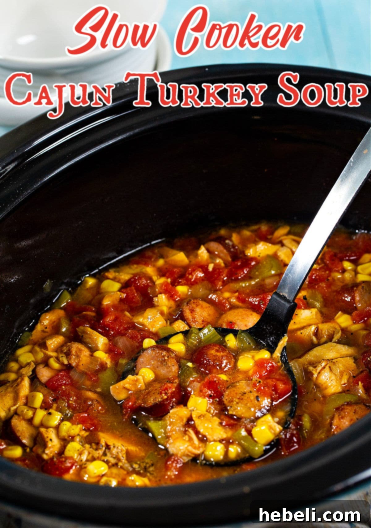 Ladle scooping soup in slow cooker, capturing the vibrant colors and hearty ingredients.