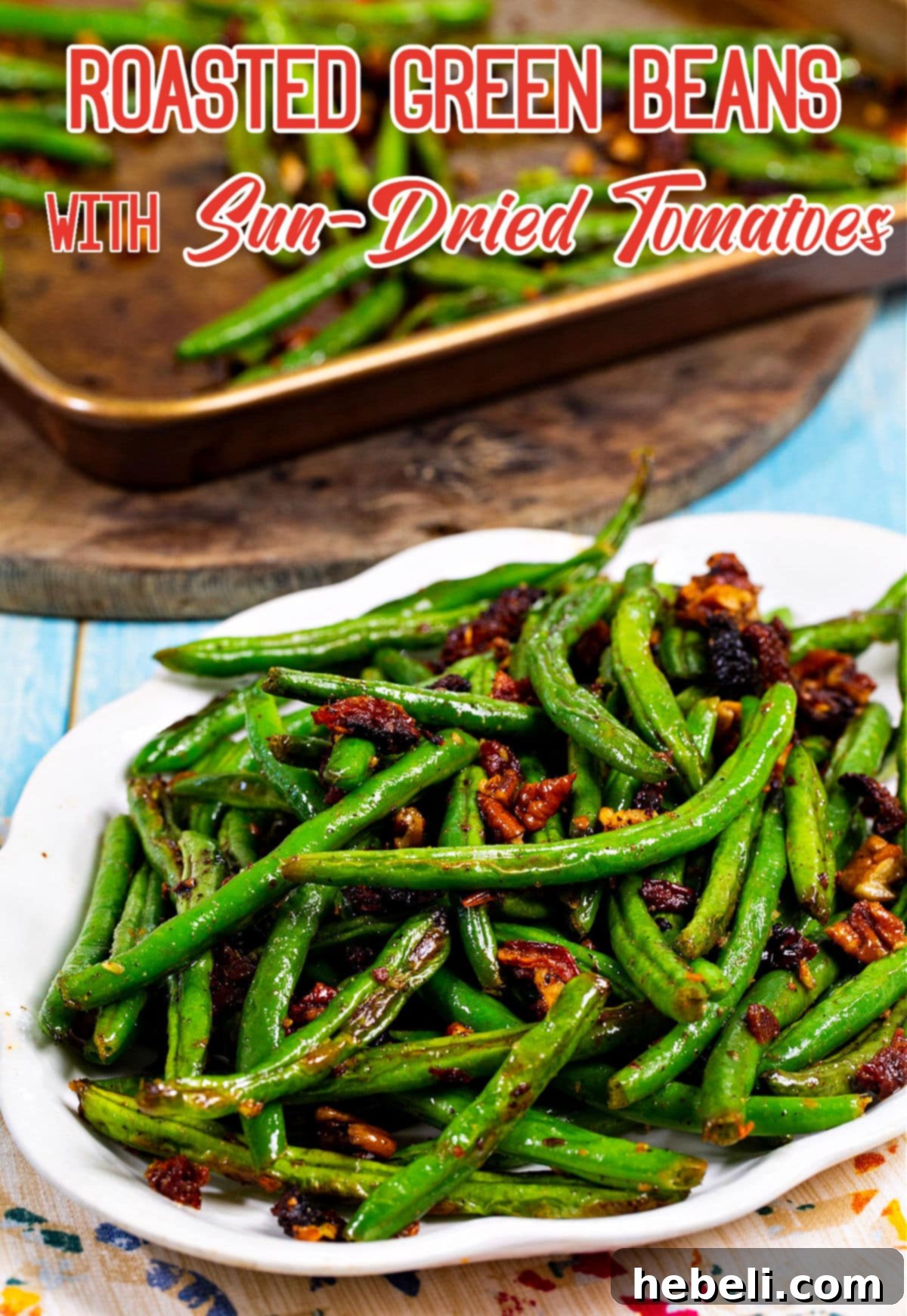 Mediterranean Roasted Green Beans with Sun-Dried Tomatoes 5 A generous serving of Roasted Green Beans with Sun-Dried Tomatoes and Toasted Pecans on a rustic serving dish.
