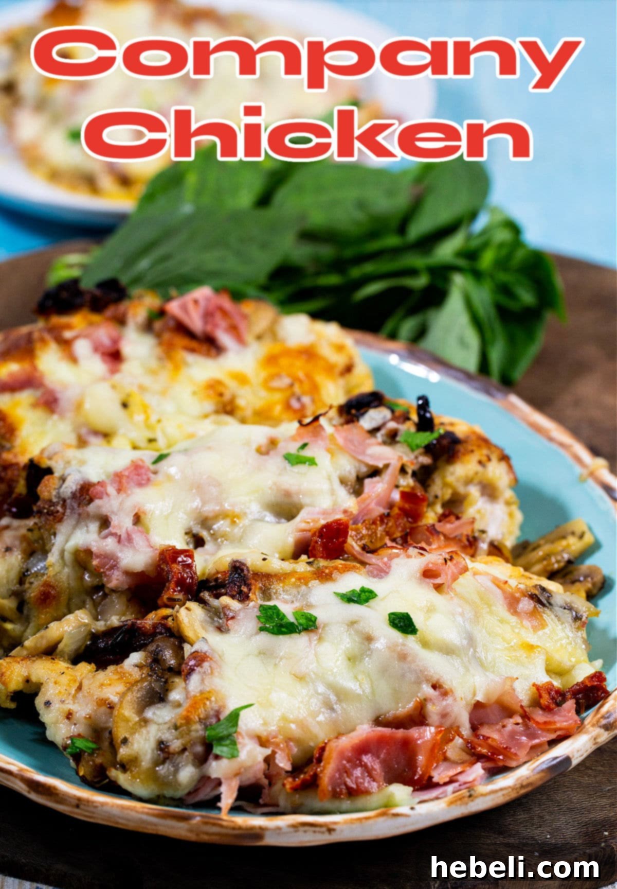 The Company Coop 5 Close-up of baked Company Chicken, showing the bubbling cheese and rich topping, ready to be served.