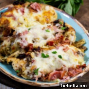 The Company Coop 7 A beautifully plated dish of Company Chicken, ready to be served.