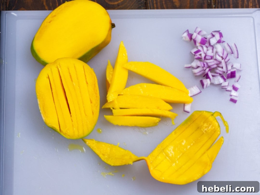 Island BBQ Pork and Mango Quesadillas 4 Perfectly sliced fresh mango pieces, ready for use.