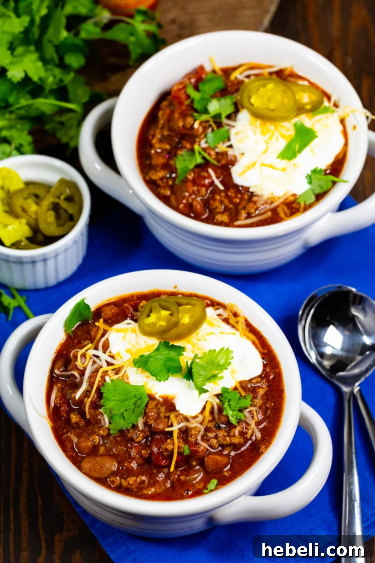 Ultimate Rotel Chili 5 Two bowls of Rotel Chili, garnished with various toppings.