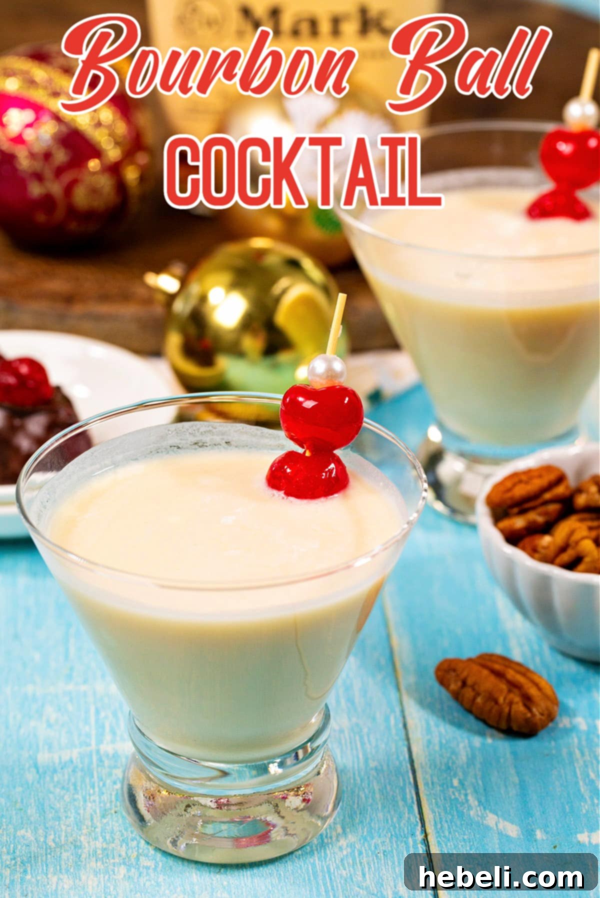 A Bourbon Ball Cocktail ready to be enjoyed, artfully presented in a martini glass with two bright maraschino cherries.