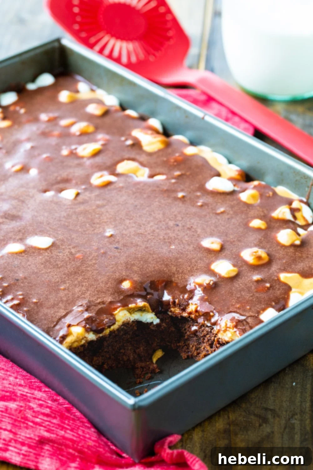 Freshly baked Peanut Butter Mississippi Mud Brownies cooling in a 9x13-inch baking pan, ready for the next delicious layers.