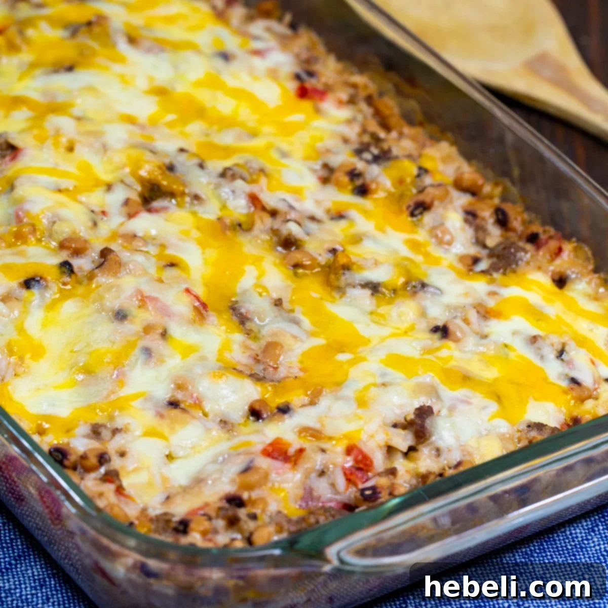 Southern Comfort Pea Bake 2 A golden-brown Black-Eyed Pea Casserole bubbling in a baking dish, ready to be served.
