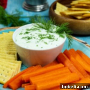 A close-up shot of the finished Benedictine Spread, showing its creamy texture and vibrant green hue, ready to be served.