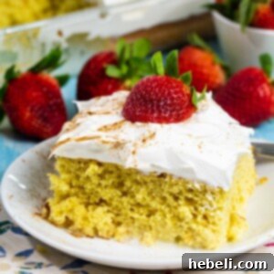 Effortless Tres Leches Cake 7 Beautifully prepared Easy Tres Leches Cake, showcasing its creamy topping and delicious appearance.