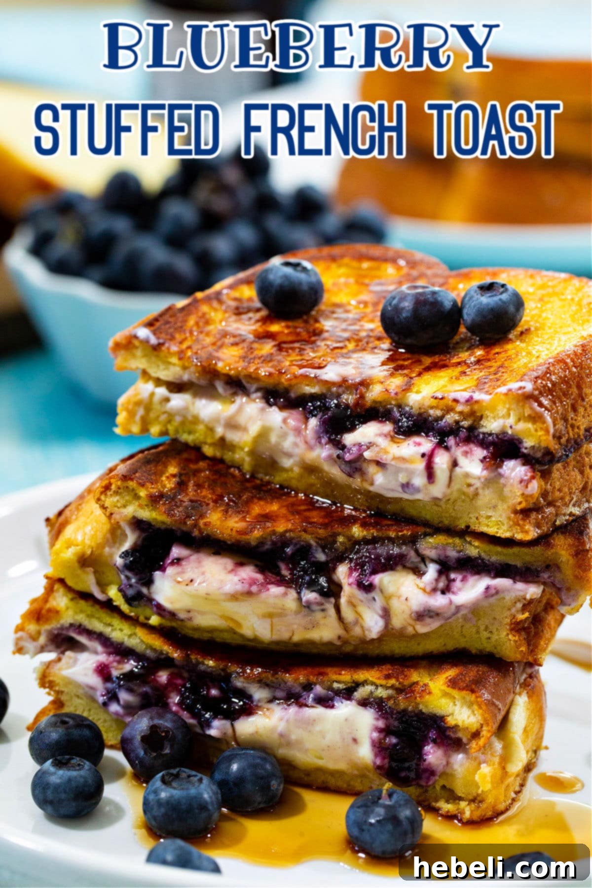 A single piece of Blueberry Stuffed French Toast on a pristine white plate, showcasing its golden exterior and inviting filling.