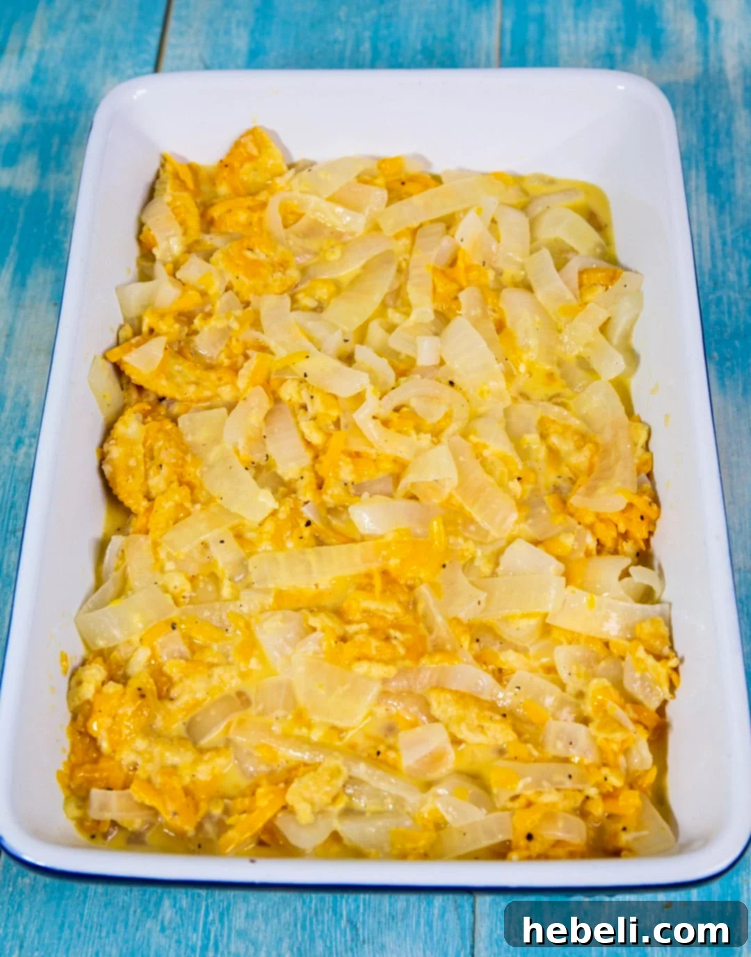 Creamy onion filling in a baking dish before adding the topping.