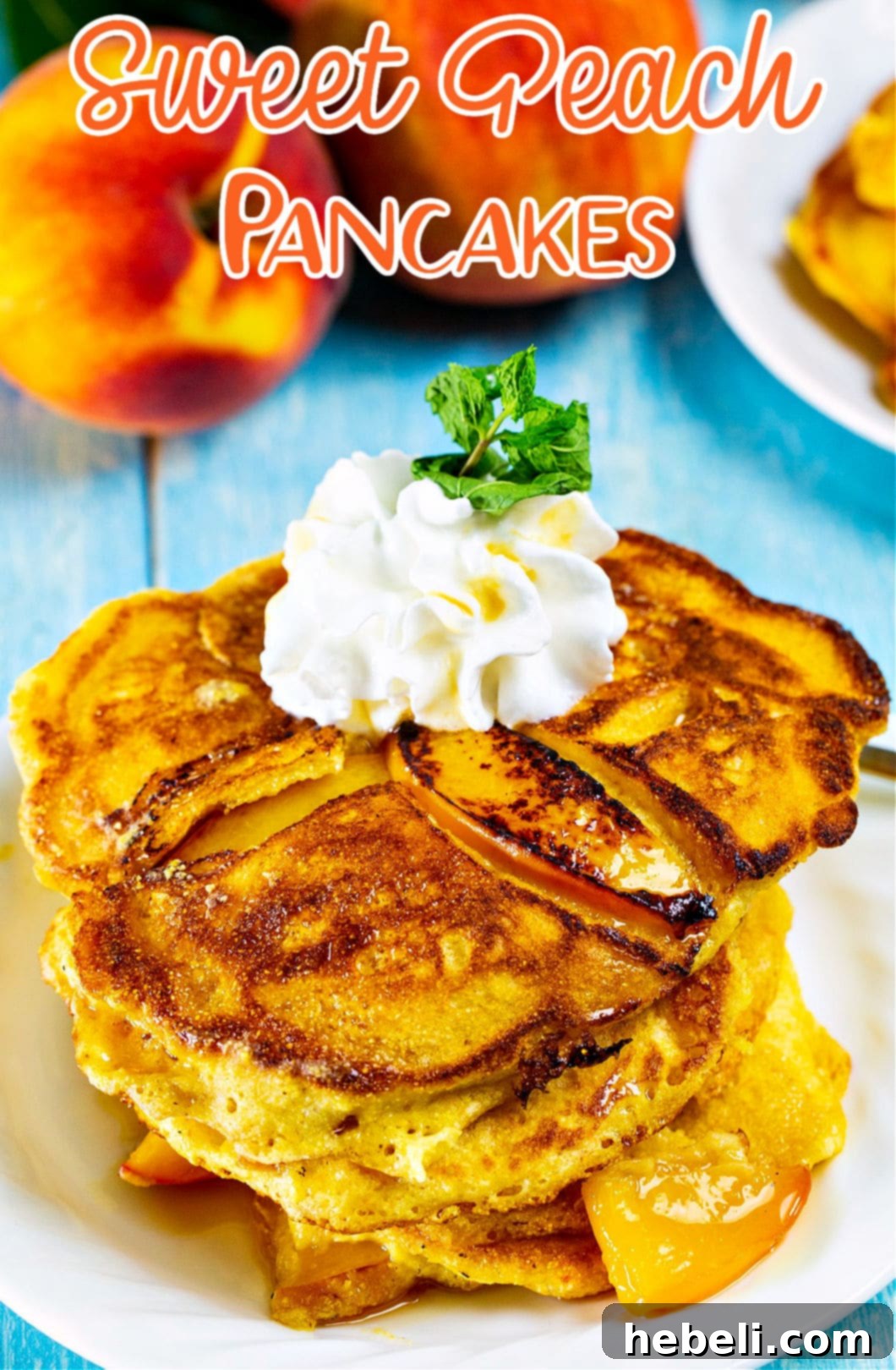 A close-up shot of Sweet Peach Pancakes, beautifully plated with whipped cream and maple syrup, ready to be served.
