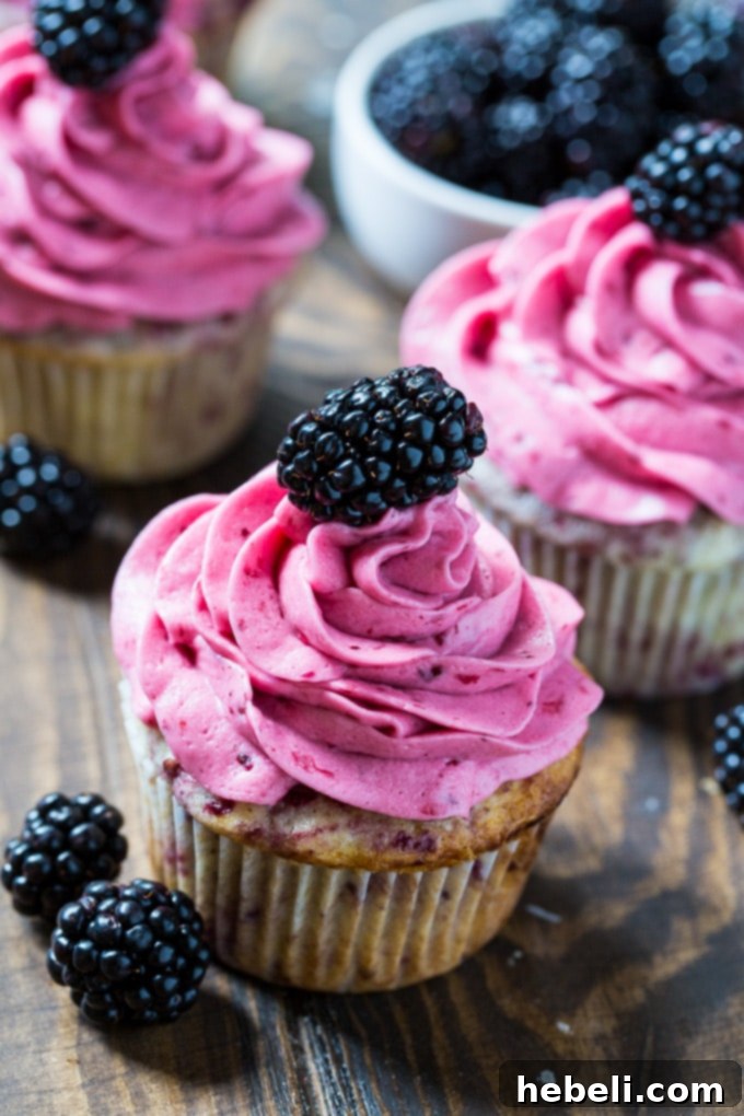 Velvet Blackberry Cupcakes 4 Close-up of Blackberry Cupcakes with Blackberry Buttercream, showcasing the swirl of fruit.