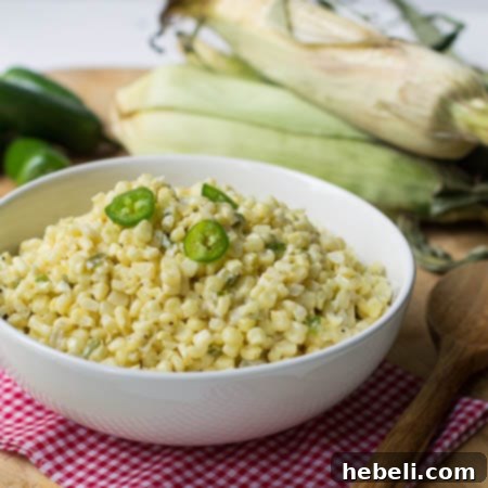 Kickin Jalapeno Creamed Corn 5 Jalapeno Creamed Corn in white serving bowl, close-up.