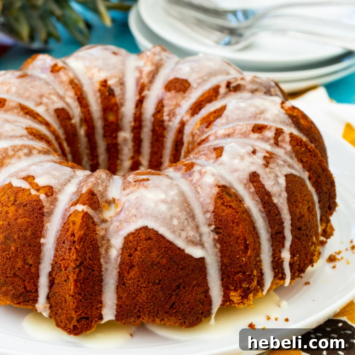 A beautifully glazed Pineapple Pound Cake, showcasing its golden-brown exterior and enticing tropical appeal.