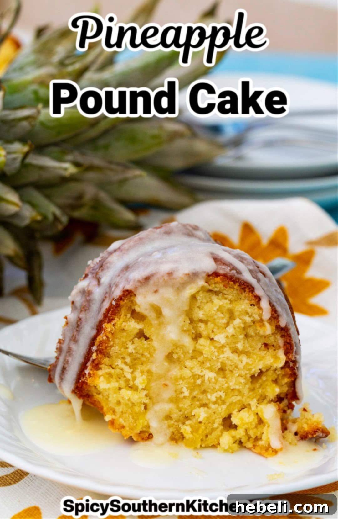 A delectable slice of Pineapple Pound Cake with glaze, served on a plate, highlighting its moist texture.