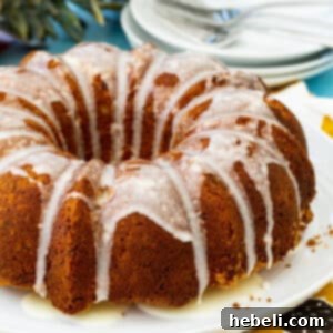 Close-up of a glazed Pineapple Pound Cake, highlighting its moist texture and golden crust.