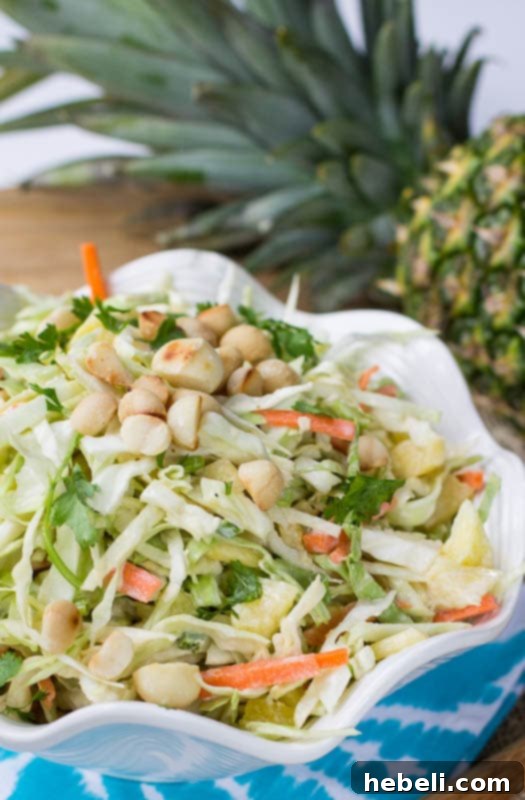 Close-up of Pineapple Macadamia Coleslaw with Coconut.