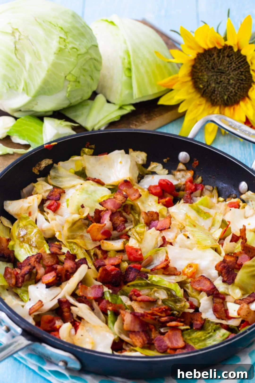 Spicy Cabbage in skillet with fresh ingredients.