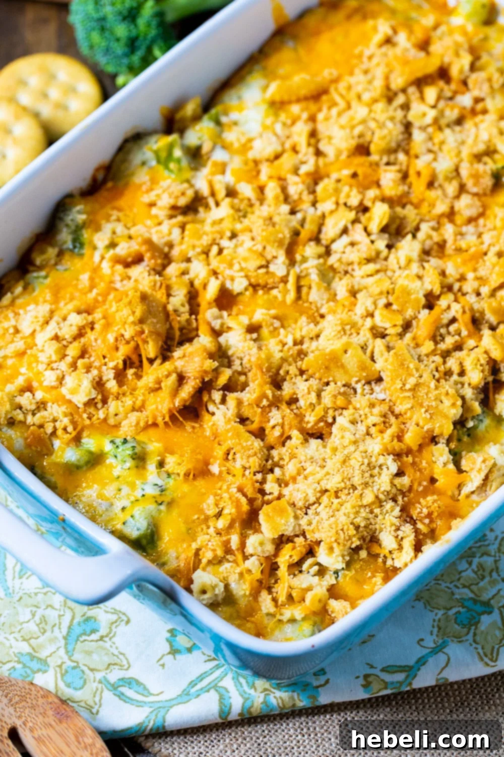 Southern Broccoli Casserole baking in a ceramic dish, golden and bubbly.