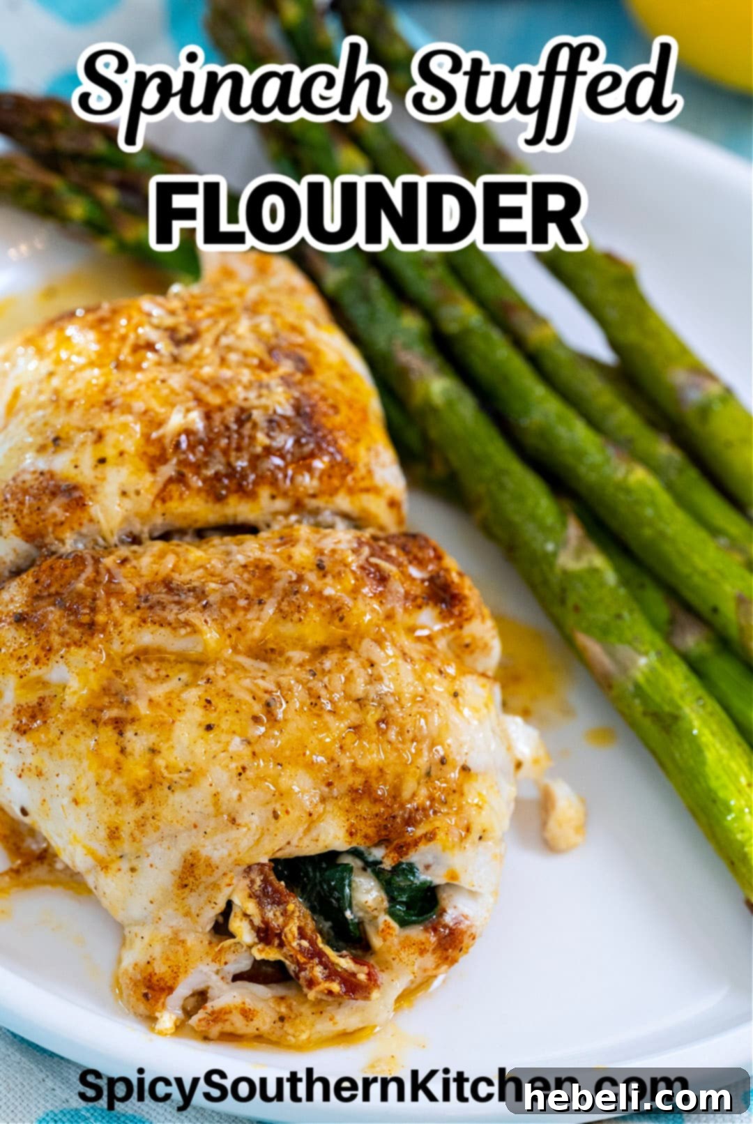 Flounder Fillets Stuffed with Creamy Spinach 6 Spinach Stuffed Flounder on plate with asparagus, ready for a delightful dinner.