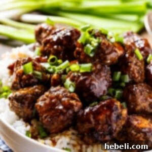 Fiery Apple Glaze Meatballs 5 Spicy Apple-Glazed Meatballs, ready to be served