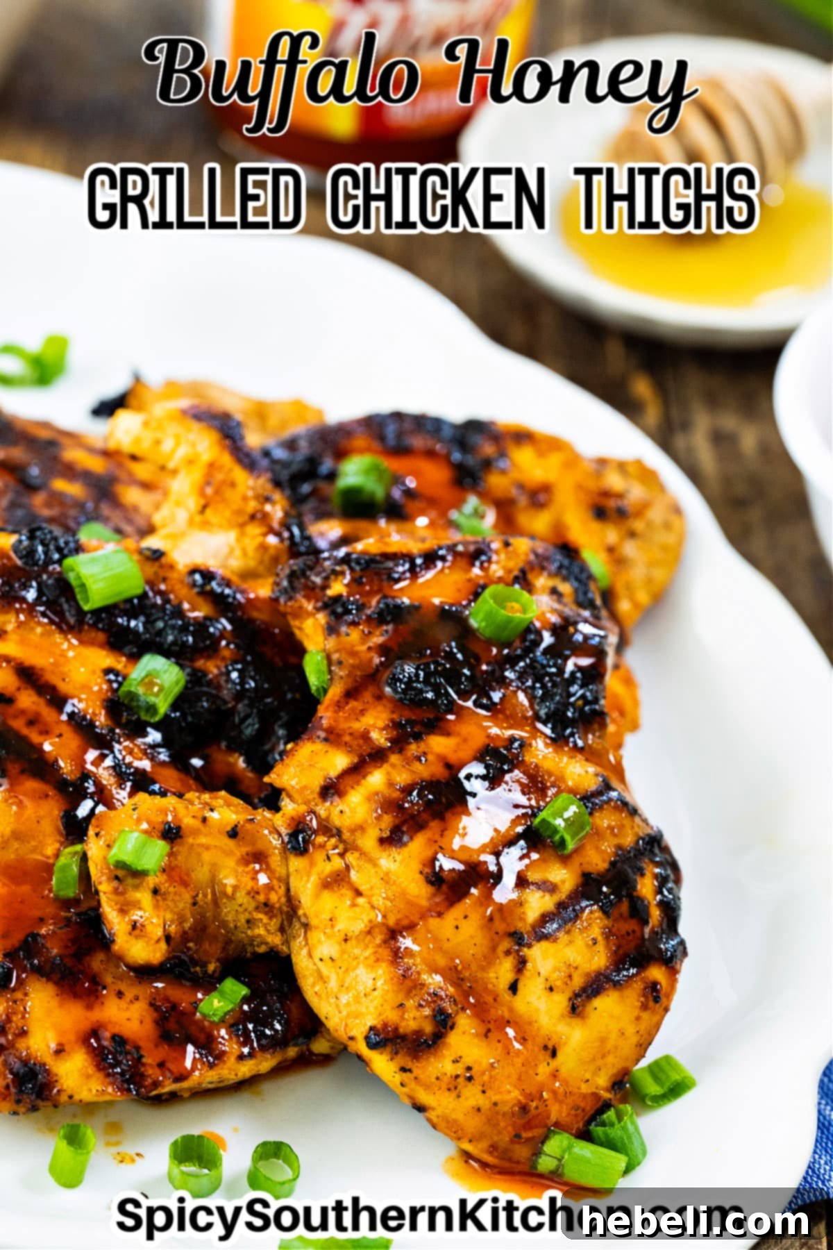 Grilled chicken thighs artfully arranged on a serving platter, ready for a delicious meal.